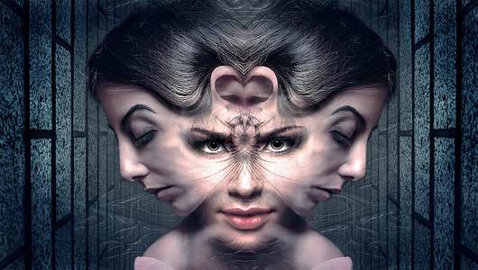 woman's mirrored-image portrait photo thumbnail