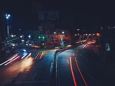 time lapse photography of road during night thumbnail