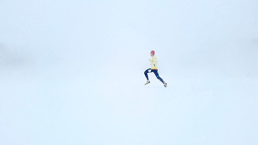 person in yellow sweater and blue pants leaping on air thumbnail