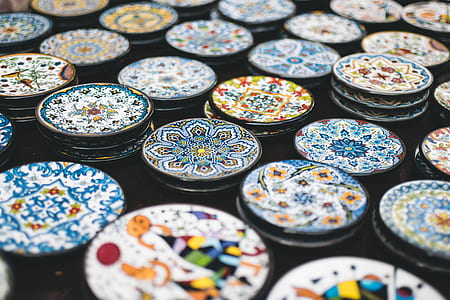 tilt shift lens photography of jar lids thumbnail
