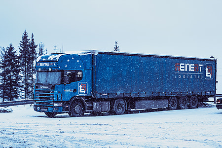 blue freight truck parked thumbnail