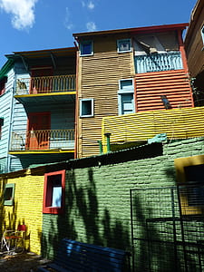 green, brown, and orange concrete house thumbnail