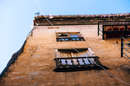 low angle photography of brown building thumbnail