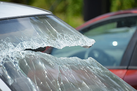 close up photo of wrecked windshield thumbnail
