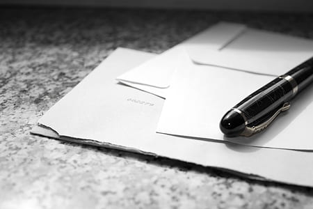 black pen on white papers thumbnail