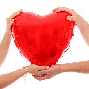 Four Hands Holding Red Heart thumbnail