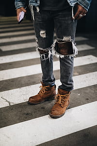 man standing on pedestrian lane thumbnail