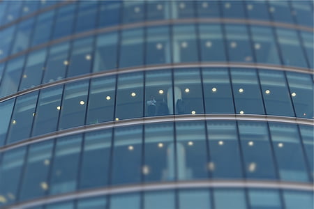 low-angle photography of glass wall building thumbnail