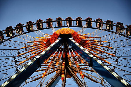 low-angle photography of gray and orange ferris wheel thumbnail