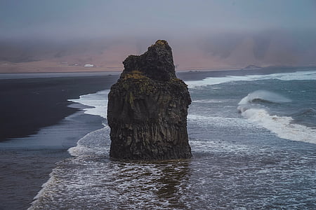 stone islet on shore thumbnail