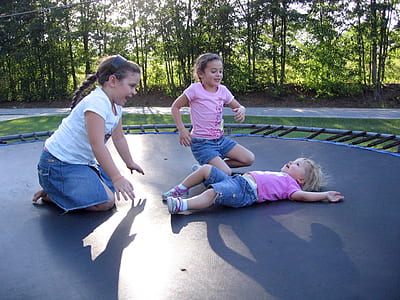 three toddler girl's on trampoline thumbnail