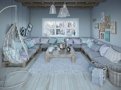 gray corner sofa with throw pillow and coffee table inside the living room thumbnail