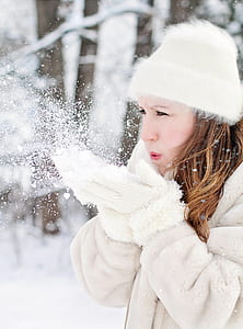 woman blowing snow thumbnail
