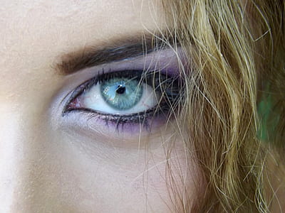 closeup photo of woman with purple eyeshadow thumbnail
