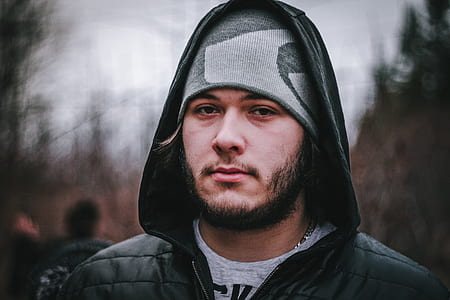man wearing black zip-up hoodie thumbnail