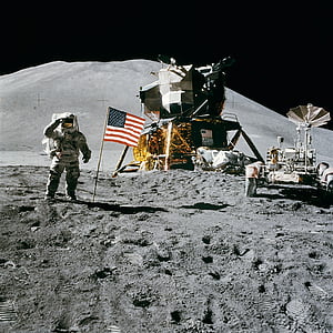 astronaut near American flag and space ship thumbnail