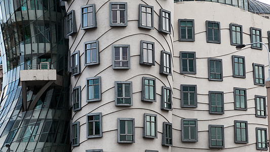 architectural photography of beige building thumbnail