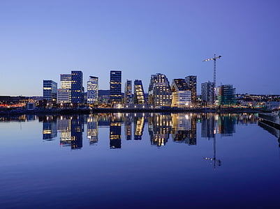 cityscape photography by water thumbnail