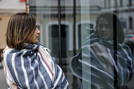 woman wearing white and blue striped top thumbnail