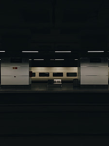 gray steel bench in the middle of train station thumbnail