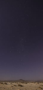 plane field under starry sky at daytime thumbnail