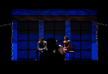 woman sitting in black chair thumbnail