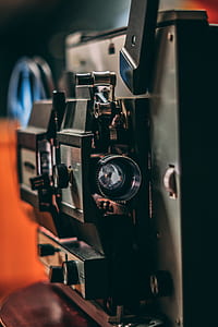 selective focus photography of reel-to-reel projector thumbnail