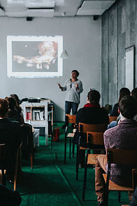 People watching a presentation in a room thumbnail