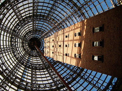 low angle view of brown high-rise building thumbnail