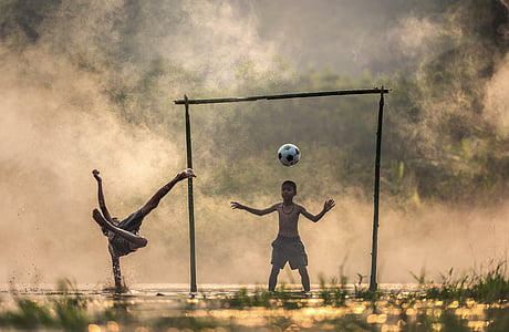 painting of two boys playing soccer thumbnail