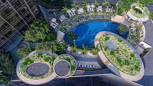 aerial view of building with garden and pool thumbnail