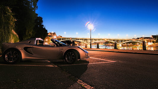 gray convertible parked beside of planyt thumbnail