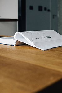 Tap catalogue on a wooden table thumbnail