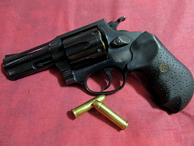 black revolver on red textile thumbnail