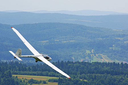 monoplane on air during daytime thumbnail