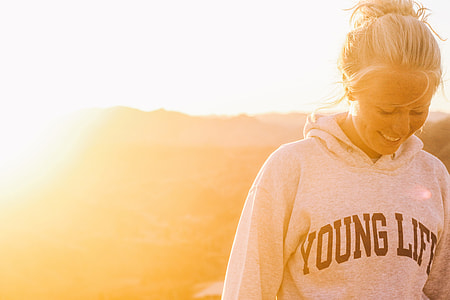A girl captured at sunset with beautiful summer sunlight thumbnail