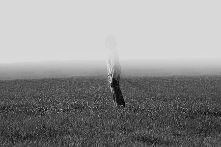 grayscale photo of standing fading woman thumbnail