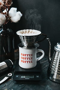 gray coffee mug on black digital scale thumbnail