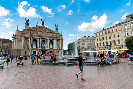 people near fountain during daytime thumbnail