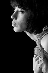 grayscale photography of woman in gray top thumbnail