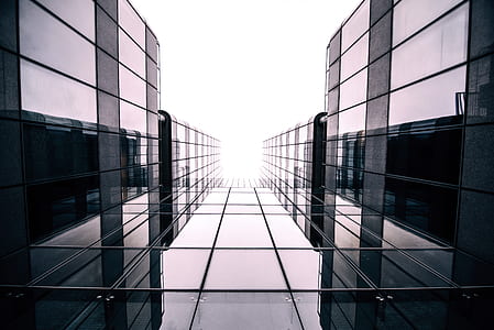 worm's-eye view photography of black building thumbnail