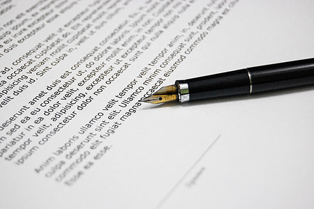 black calligraphy pen on white paper thumbnail