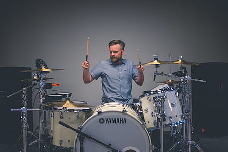 person using drum set thumbnail