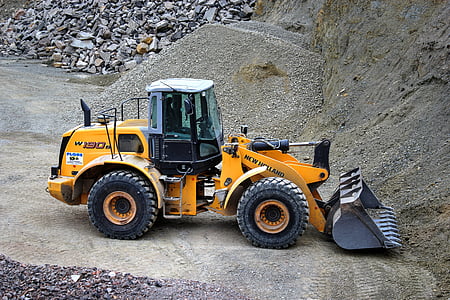 yellow and black New Holland skid loader thumbnail