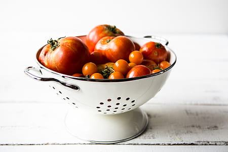 tomatoes on metal strainer bowl thumbnail