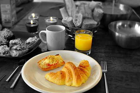 selective photography of bread on white round plate thumbnail