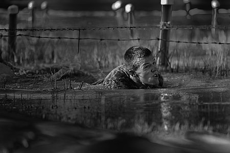man in body of water during night time thumbnail