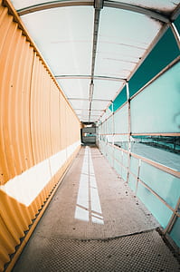 gray and beige metal pathway with roof fisheye lens photographt thumbnail