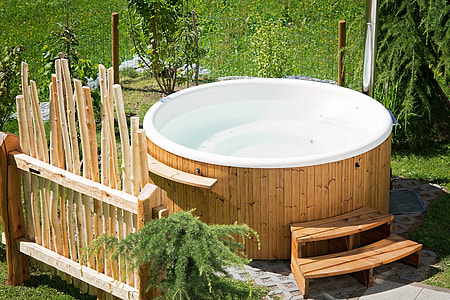 brown wooden and white ceramic hot tub thumbnail