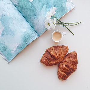 Relaxing with croissants and coffee espresso at home thumbnail